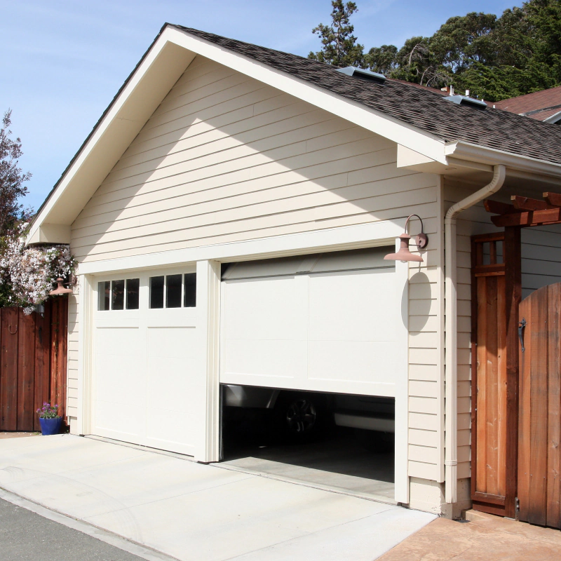 small mini garage with automatic garage door